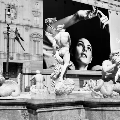 a statue of a woman on top of a fountain at Caesar's Nest in Rome