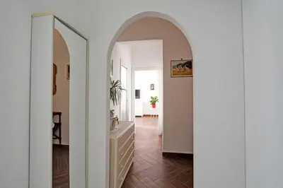 an archway in a hallway with a dresser at A casa di Chloe - Ponte Milvio in Rome