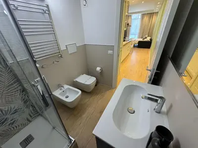 a bathroom with a sink and a toilet at Vaticano Appartamento Suite Roma Centro Aura D2 in Rome