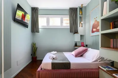 a small bedroom with a bed in a room at Casina Doria Pamphili in Rome