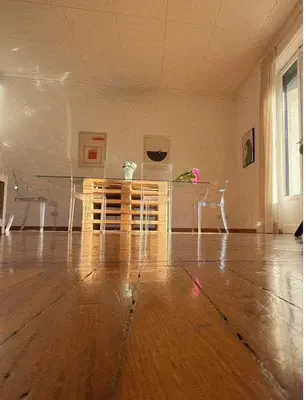 an empty room with a table and chairs in it at Eleganza&Confort in Roma-Liberty- in Rome