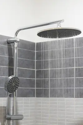 a shower with a shower head in a bathroom at Giano Vatican Suites - Metro Cipro in Rome