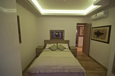 a bedroom with a large bed in a room at Piramide House in Rome