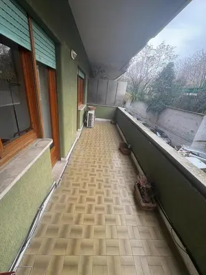 an empty hallway of a building with a window at Apartment in Trastevere 41 in Rome