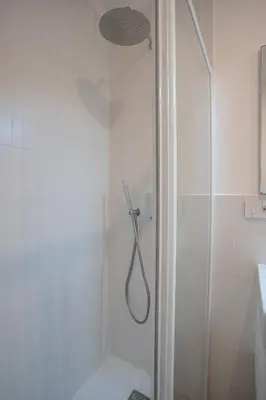 a shower in a bathroom with a toilet and a sink at Luxury Sweet Home Labicana in Rome
