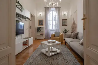 a living room with a couch and a table at Casa Nicalandro Roma Centro in Rome