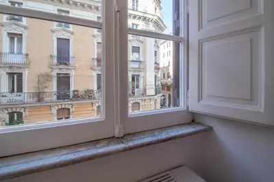 an open window with a view of a city at Casa Nicalandro Roma Centro in Rome