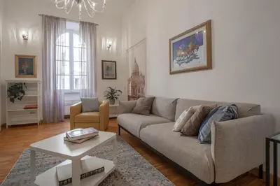 a living room with a couch and a table at Casa Nicalandro Roma Centro in Rome