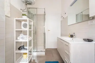 a bathroom with a shower and a sink at St Peter apartment with Garage in Rome