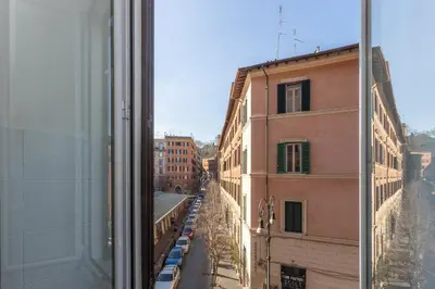 a view of a city street from a window at Casa Assunta in Rome