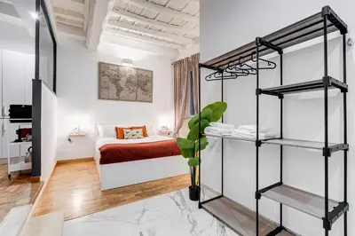 a bedroom with a bunk bed in a room at Trastevere One by GHOR in Rome