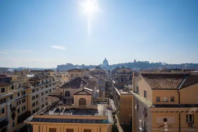 an aerial view of a city with buildings at Elegantis La Dolce Vista Apartment with private terrace and fantastic View in Rome