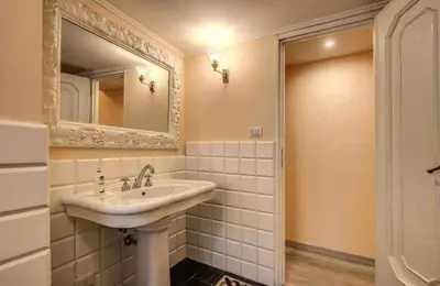 a bathroom with a sink and a mirror at Casa Vacanze Crispi little 2 in Rome