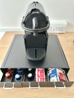 a toaster is sitting on top of a drawer at Rhome in Rome