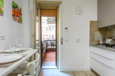 a kitchen with a sink and a counter top at Prosper House in Rome