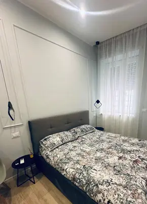 a bedroom with a bed and a window at Bold apartment 2 in Rome