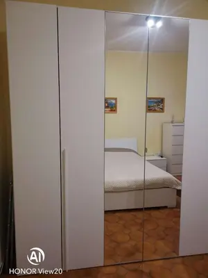 a bedroom with a bed and a glass door at DuPigne' House in Rome