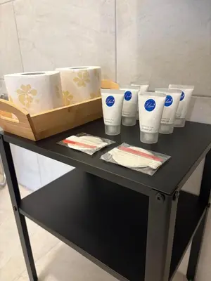 a table with a bunch of cups on it at Quattro Venti city suites in Rome