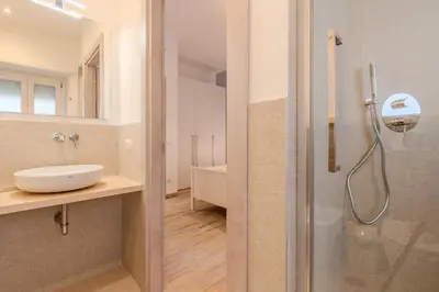 a bathroom with a shower and a sink at Maria Magdalena Apartment Saint Peter's in Rome