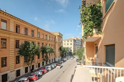 a city street with cars parked on the street at Maria Magdalena Apartment Saint Peter's in Rome