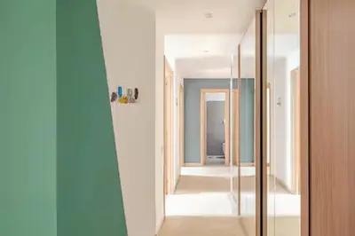 a hallway with a glass door leading into a room at Casa Bella in Rome