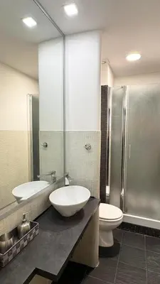 a bathroom with a sink and a toilet and a shower at Raffy in Rome in Rome