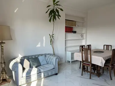 a living room with a couch and a table at Holidays in Rome at Luigi's in Rome