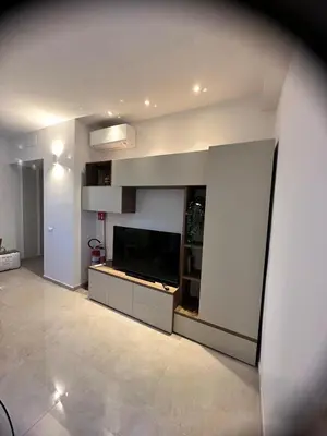 a living room with a flat screen tv in a room at Welcome to Campo De' Fiori in Rome