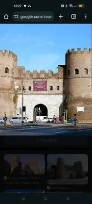 a view of a castle with a sign in front of it at Chez Noel in Rome