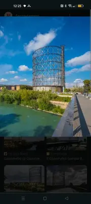a view of a river with a building in the background at Chez Noel in Rome