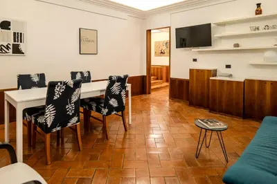 a dining room with a table and chairs at Restart Accommodations Pantheon in Rome