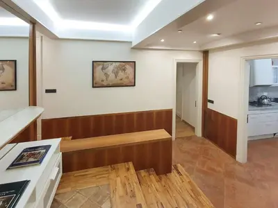 a living room with a bench on the wall at Restart Accommodations Pantheon in Rome