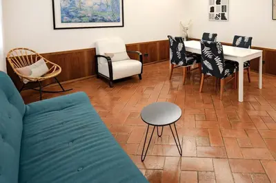 a living room with a couch and chairs and a table at Restart Accommodations Pantheon in Rome