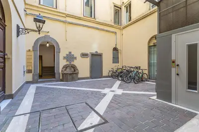 a courtyard with bikes parked next to a building at Spanish Steps Exclusive 3BDR in Rome
