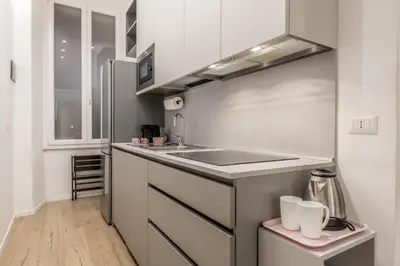 a kitchen with a sink and a counter top at CdR 190 - Vaticano in Rome