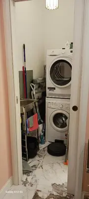 a messy kitchen with a stove and a microwave at Tu chiamale emozioni intero appartamento in Rome
