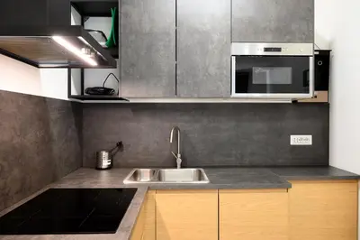 a kitchen with a sink and a microwave at Domus Pio VIII in Rome