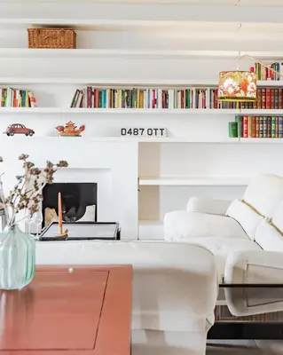 a living room with a couch and a coffee table at Loft Piazza Vittorio - Zen 38 in Rome