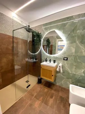 a bathroom with a sink and a shower at Roma Tourist Rentals in Rome