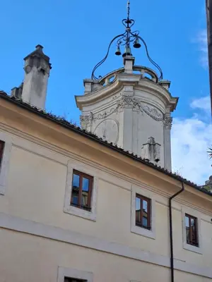 a building with a clock tower on top of it at Home Piazza Dell'Orologio in Rome
