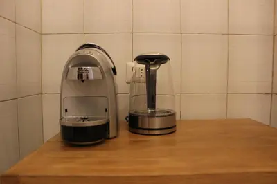 a coffee maker sitting on top of a counter at Tiberim, Centro Storico in Rome