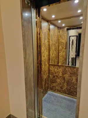 a shower with a glass door in a room at AGH Babuino in Rome