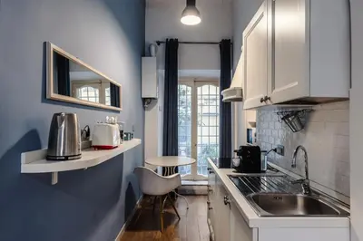 a kitchen with a sink and a counter top at Vatican Home in Rome