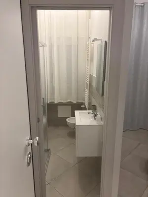 a bathroom with a sink and a toilet at Guest House Vatican Room da Gabry in Rome