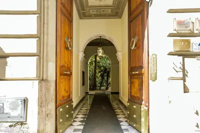 an internal hallway of a house with an archway at Stylish Studio in Sallustiano in Rome