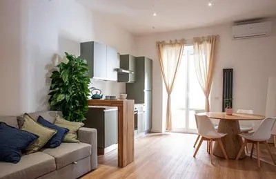 a living room with a couch and a table at Casa Monteverde near Trastevere and the city center in Rome