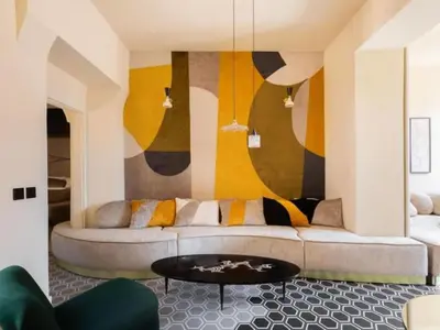 a living room with a couch and a table at Apartment La Dolce Vita by Interhome in Rome