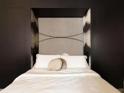 a pillow sitting on top of a bed at Apartment La Dolce Vita by Interhome in Rome