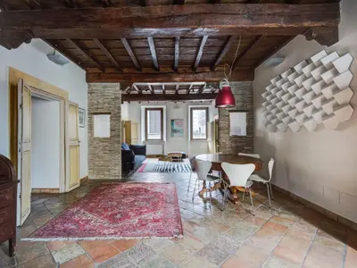 a large living room with a table and chairs at Apartment Pantheon View by Interhome in Rome