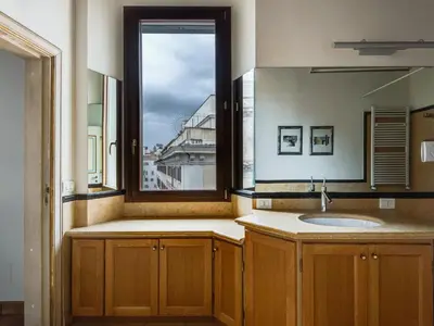 a bathroom with a sink and a window at Apartment Pantheon View by Interhome in Rome